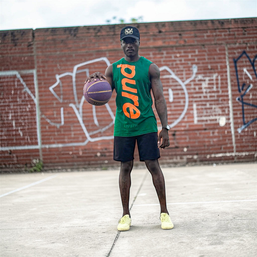 Green sleeveless shirt w/ orange print